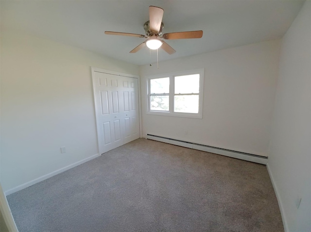 14 Laddie Rd, Middletown, NY 10941 - unfurnished bedroom featuring baseboard heating, carpet, a closet, and a ceiling fan