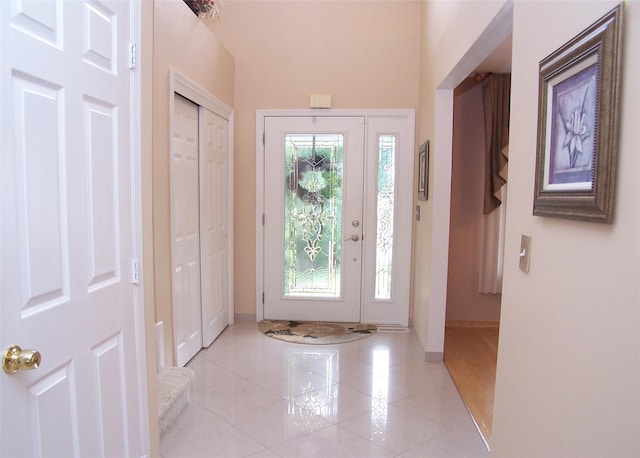 8 Long House Way, Commack, NY 11725 - entrance foyer with baseboards and light tile patterned flooring