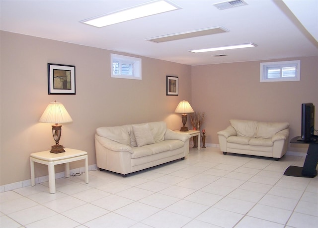 8 Long House Way, Commack, NY 11725 - living area with baseboards and light tile patterned floors