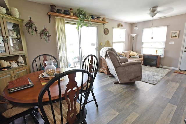 310 Fairview Cir, Middle Island, NY 11953 - dining area with healthy amount of natural light, wood finished floors, and a ceiling fan