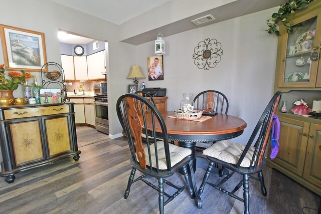310 Fairview Cir, Middle Island, NY 11953 - dining space with dark wood-type flooring
