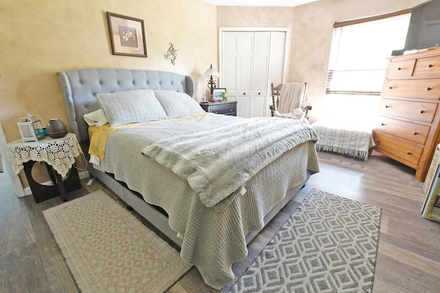310 Fairview Cir, Middle Island, NY 11953 - bedroom featuring wood finished floors and a closet