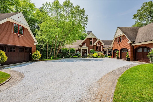 218 Kuhne Rd, Call Listing Agent, CT 06488 - shingle-style home featuring gravel driveway, roof with shingles, and a garage