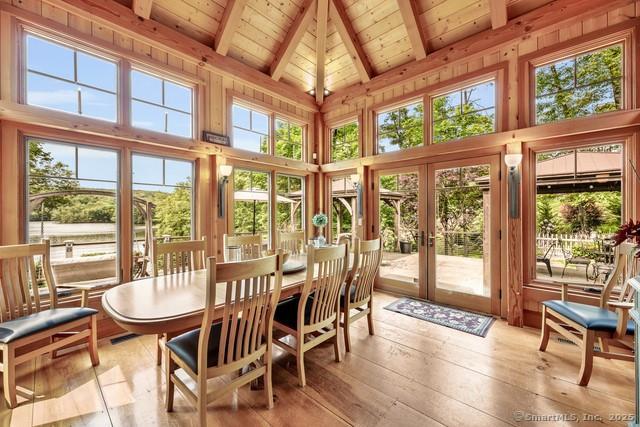 218 Kuhne Rd, Call Listing Agent, CT 06488 - sunroom with french doors and healthy amount of natural light