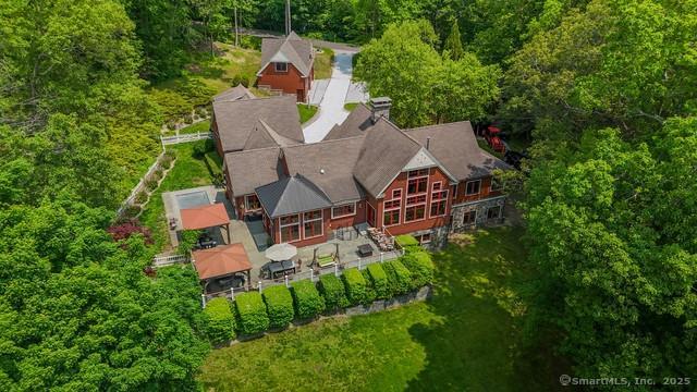 218 Kuhne Rd, Call Listing Agent, CT 06488 - aerial view of property and surrounding area with a heavily wooded area