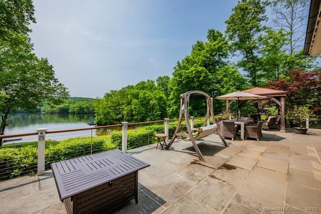 218 Kuhne Rd, Call Listing Agent, CT 06488 - view of patio / terrace featuring a water view and outdoor dining space
