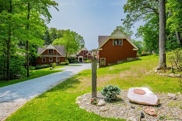 218 Kuhne Rd, Call Listing Agent, CT 06488 - view of side of property with a lawn