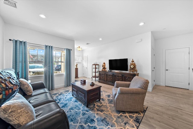 105 Captain S Way, Copiague, NY 11726 - living area with wood finished floors and recessed lighting