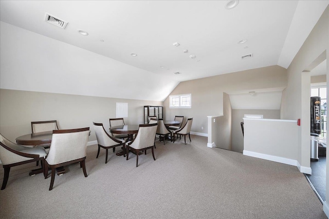 105 Captain S Way, Copiague, NY 11726 - carpeted dining area with lofted ceiling and recessed lighting