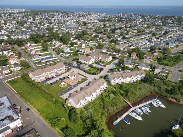 105 Captain S Way, Copiague, NY 11726 - aerial overview of property's location with a large body of water and nearby suburban area