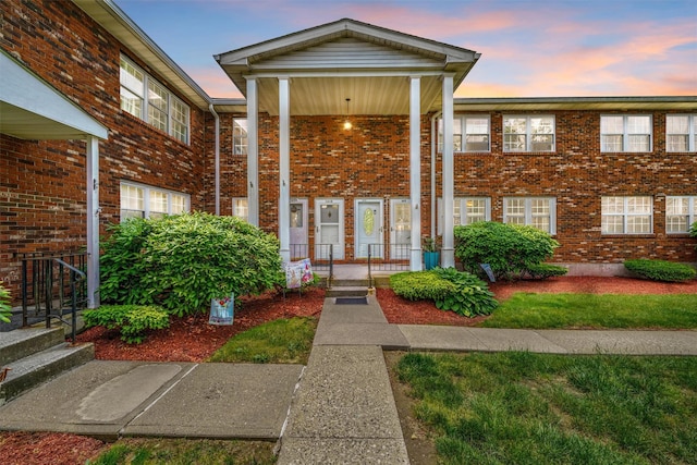 276 Temple Hill Rd Unit 1611, Vails Gate, NY 12553 - view of front of property featuring brick siding and covered porch