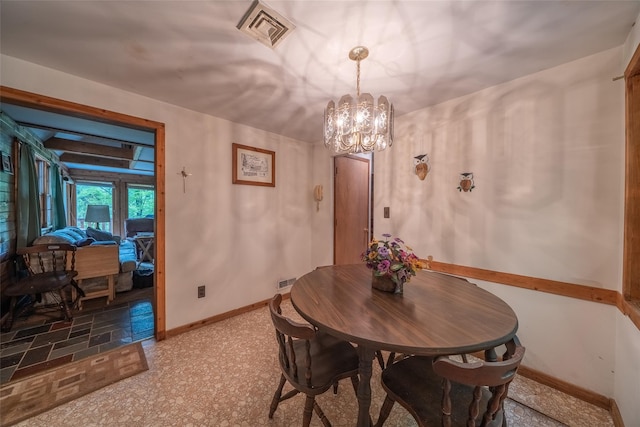 442 Main St, Grahamsville, NY 12740 - dining area with baseboards and a chandelier