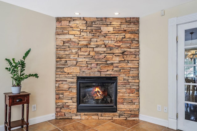 23 Antona Blvd, Centereach, NY 11720 - detailed view of a stone fireplace and recessed lighting