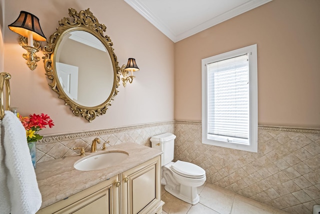 23 Antona Blvd, Centereach, NY 11720 - half bathroom featuring tile walls, healthy amount of natural light, tile patterned floors, wainscoting, and vanity