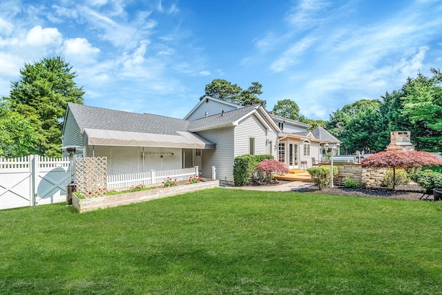 23 Antona Blvd, Centereach, NY 11720 - view of front of home featuring roof with shingles and a deck
