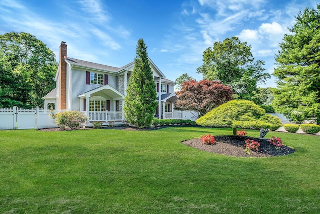 23 Antona Blvd, Centereach, NY 11720 - rear view of house featuring a chimney