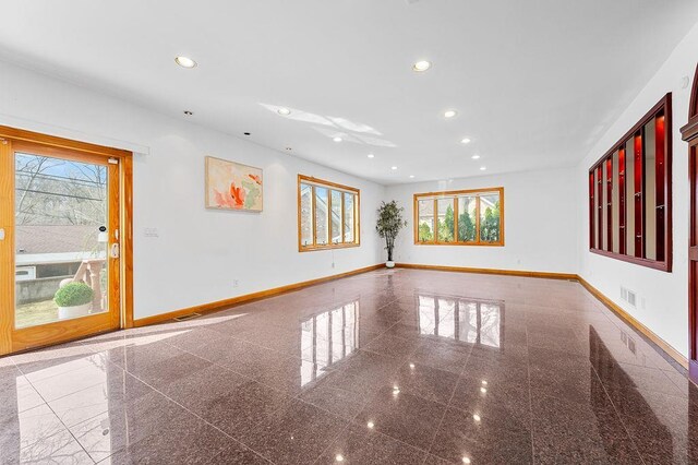 64-16 211th St, Bayside, NY 11364 - unfurnished room featuring granite tiled floors and recessed lighting