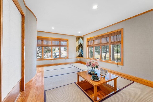 64-16 211th St, Bayside, NY 11364 - living area with ornamental molding, recessed lighting, and wood finished floors