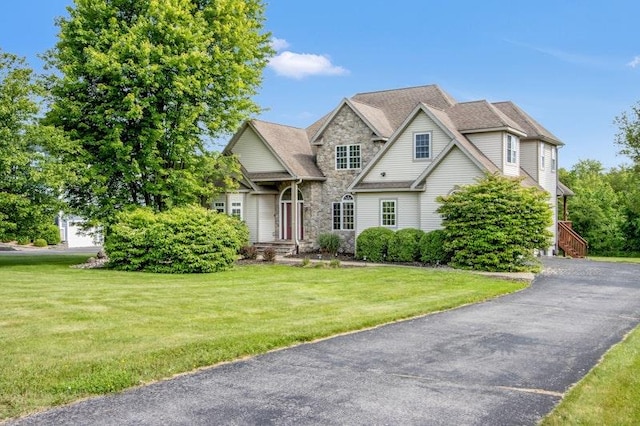 32 Gellatly Dr, Wappingers Falls, NY 12590 - view of front of home featuring stone siding and a front yard