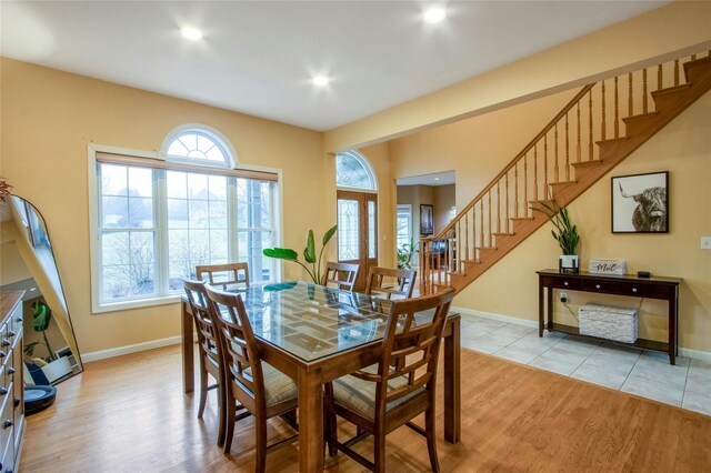 32 Gellatly Dr, Wappingers Falls, NY 12590 - dining area featuring stairs, light wood finished floors, and recessed lighting