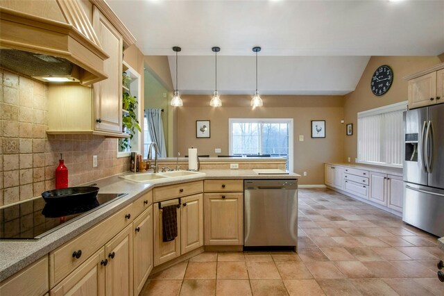 32 Gellatly Dr, Wappingers Falls, NY 12590 - kitchen featuring appliances with stainless steel finishes, lofted ceiling, a peninsula, premium range hood, and light countertops
