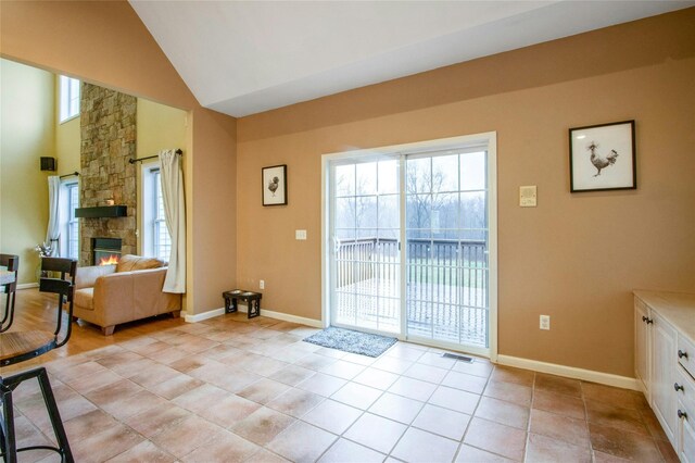 32 Gellatly Dr, Wappingers Falls, NY 12590 - entryway featuring a stone fireplace and high vaulted ceiling