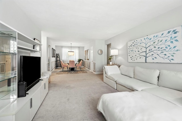 1 Avon Cir Unit D, Rye Brook, NY 10573 - living area featuring a chandelier and light colored carpet