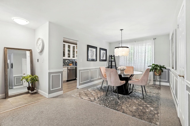 1 Avon Cir Unit D, Rye Brook, NY 10573 - dining area with light carpet and a chandelier