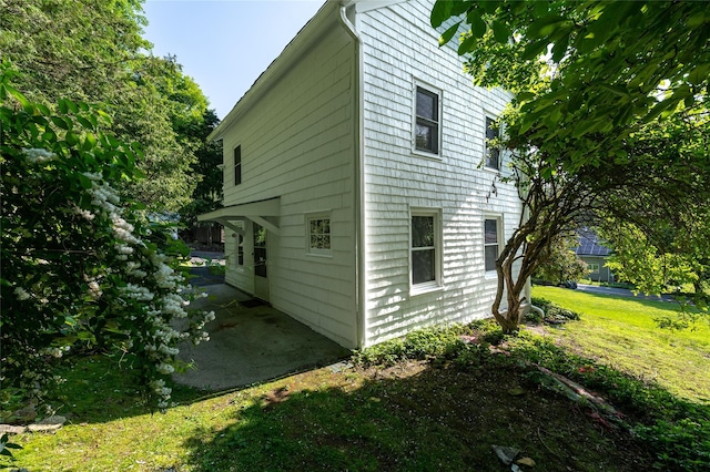 414 Bear Ridge Rd, Pleasantville, NY 10570 - view of home's exterior with a patio and a yard