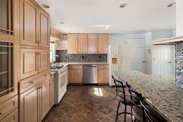 414 Bear Ridge Rd, Pleasantville, NY 10570 - kitchen with white appliances, light stone counters, decorative backsplash, open shelves, and a kitchen breakfast bar