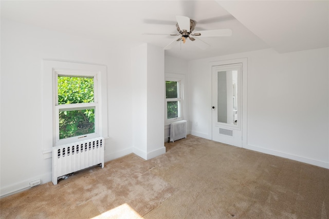 414 Bear Ridge Rd, Pleasantville, NY 10570 - carpeted empty room with radiator and a ceiling fan