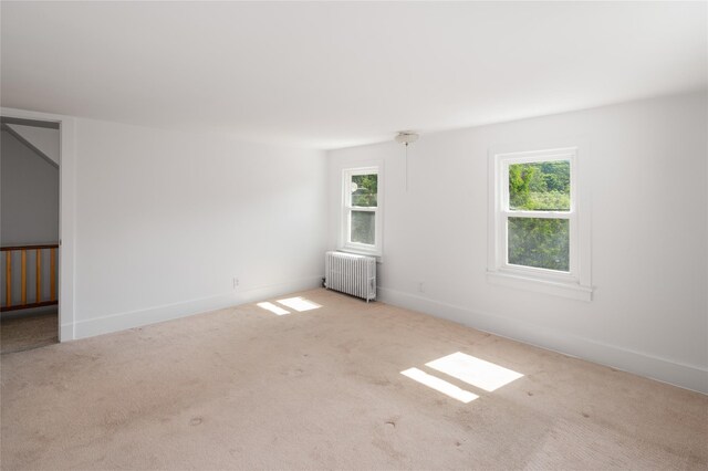 414 Bear Ridge Rd, Pleasantville, NY 10570 - carpeted empty room featuring radiator heating unit and baseboards