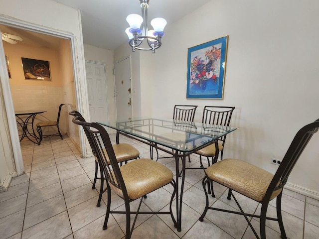 2251 Plumb 1st St Unit 6B, Brooklyn, NY 11229 - dining area featuring light tile patterned floors and a chandelier