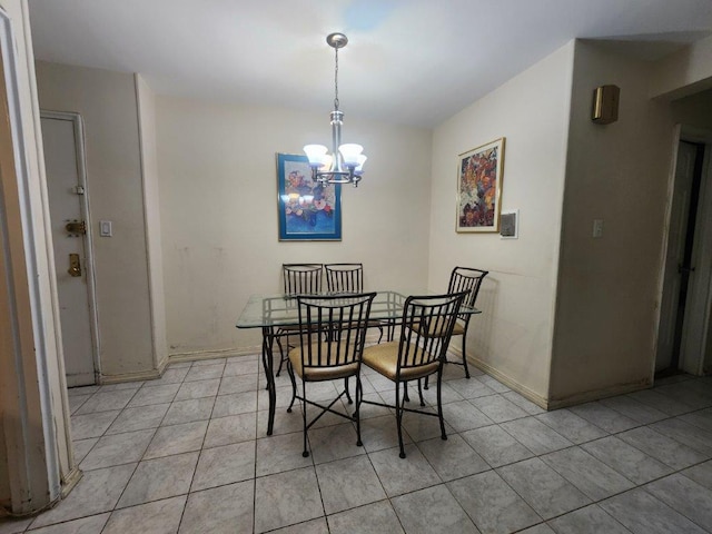 2251 Plumb 1st St Unit 6B, Brooklyn, NY 11229 - dining space with light tile patterned floors and a chandelier