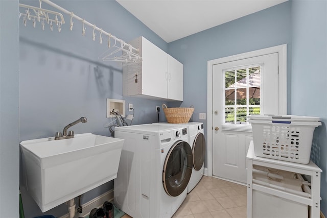 41 Carlton Dr, Mount Kisco, NY 10549 - washroom with cabinet space, washer and dryer, and light tile patterned floors