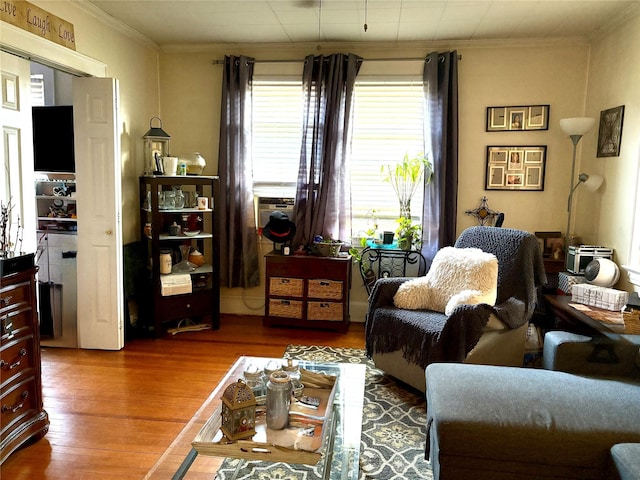 44 Waldo Ave, East Rockaway, NY 11518 - living area with plenty of natural light, wood finished floors, and ornamental molding