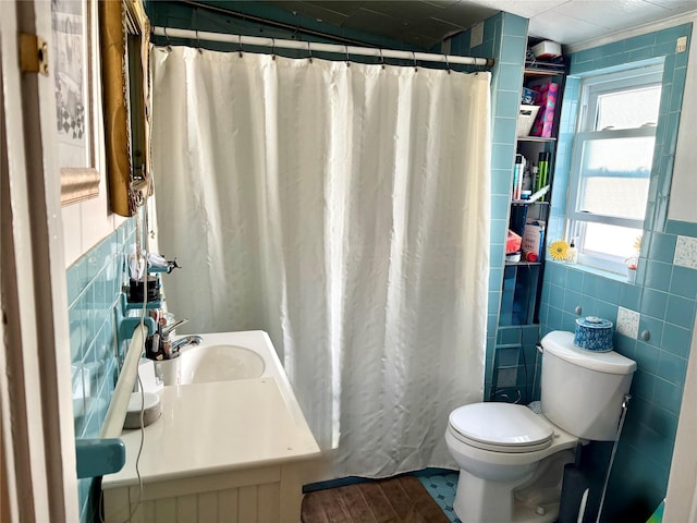 44 Waldo Ave, East Rockaway, NY 11518 - bathroom with tile walls, vanity, and a shower with shower curtain