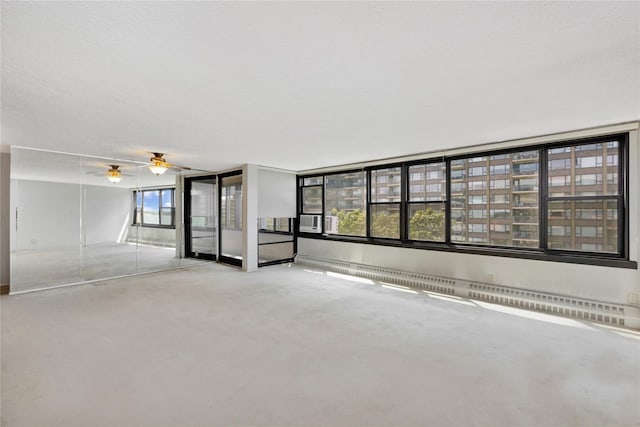 16641 Powells Cove Blvd Unit 6A, Beechhurst, NY 11357 - empty room with healthy amount of natural light, carpet, a ceiling fan, and cooling unit