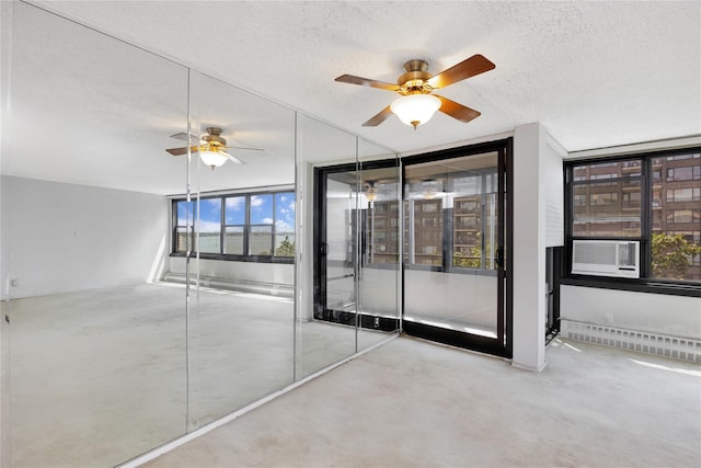 16641 Powells Cove Blvd Unit 6A, Beechhurst, NY 11357 - spare room with a textured ceiling, ceiling fan, and cooling unit