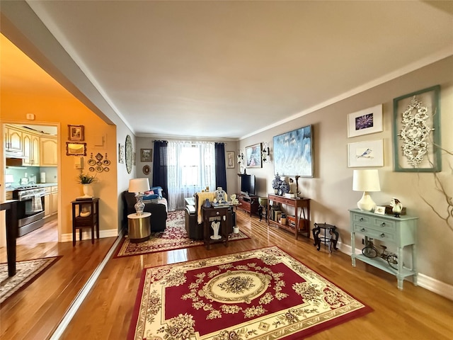 143-50 Hoover Ave Unit 302, Bayside, NY 11435 - living area featuring light wood-style floors and ornamental molding