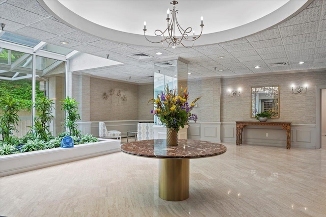 1270 N Ave Unit 5A, New Rochelle, NY 10804 - community lobby with a decorative wall, a wainscoted wall, and recessed lighting