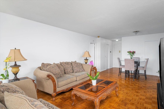 1270 N Ave Unit 5A, New Rochelle, NY 10804 - living area with a textured ceiling