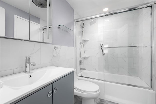 1270 N Ave Unit 5A, New Rochelle, NY 10804 - full bathroom featuring vanity, shower / bath combination with glass door, tile walls, and recessed lighting