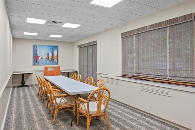 1270 N Ave Unit 5A, New Rochelle, NY 10804 - carpeted dining area with baseboards and a drop ceiling