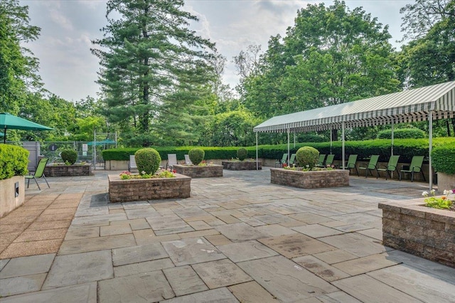 1270 N Ave Unit 5A, New Rochelle, NY 10804 - view of patio with view of wooded area