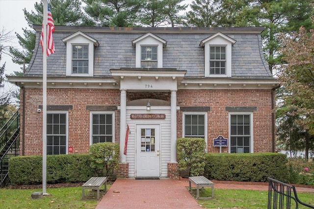 1270 N Ave Unit 5A, New Rochelle, NY 10804 - view of front of property featuring mansard roof, brick siding, and a high end roof