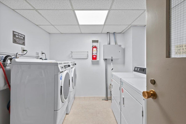 1270 N Ave Unit 5A, New Rochelle, NY 10804 - shared laundry with independent washer and dryer and light tile patterned floors