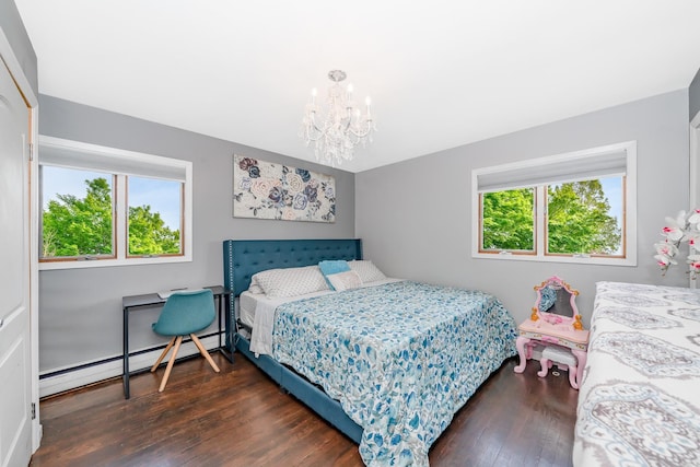 255 Rose St, Copiague, NY 11726 - bedroom featuring a baseboard radiator, wood finished floors, and a chandelier