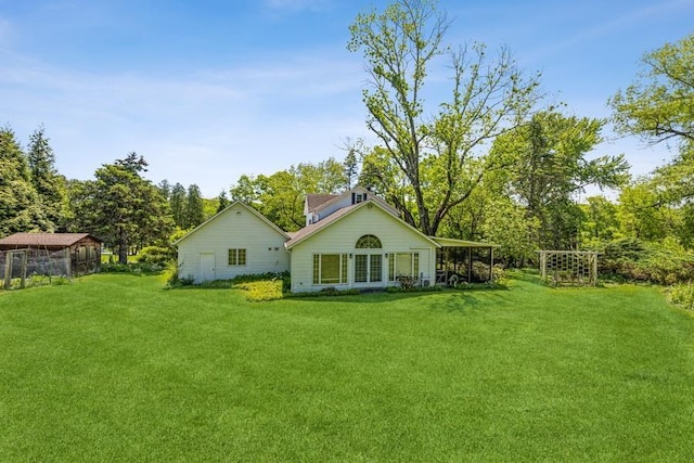 124 Willow Tree Rd, Call Listing Agent, NY 10952 - rear view of house with a lawn