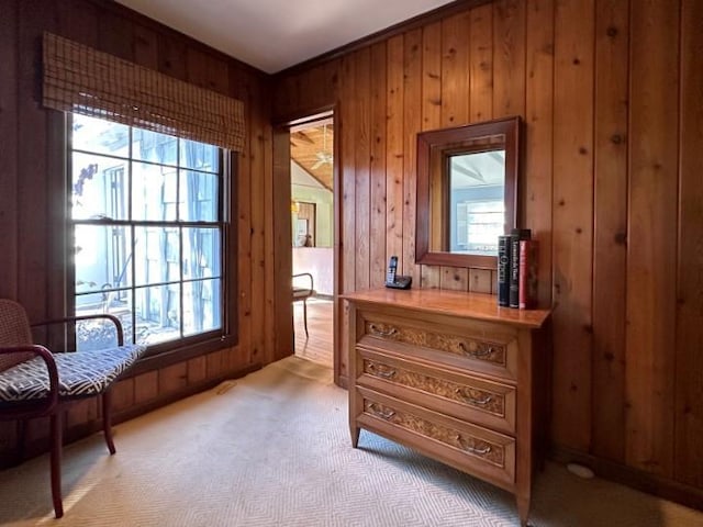 146 Doctors Walk, Cherry Grove, NY 11782 - sitting room featuring wooden walls, healthy amount of natural light, and light colored carpet